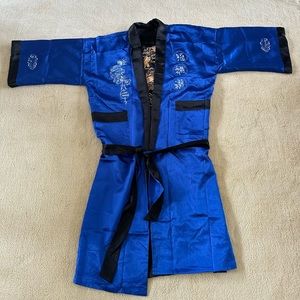 Beautiful royal blue/black reversible embroidered dragon robe.  Worn once!